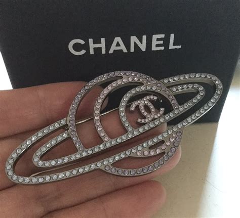 chanel saturn brooch|the brooches.